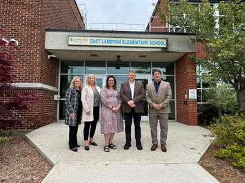 Submitted photo. (L to R) - Manager County of Lambton Children’s Services Department Kim Godin, North Lambton Child Care Executive Director Claire Giles, East Lambton Elementary School Principal Randi McDonald, Warwick Township Mayor Todd Case, Director of Education Gary Girardi.