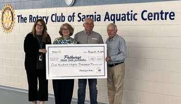 Members of Pathways with a cheque for the therapeutic pool (Photo by: Pathways Health Centre for Children)