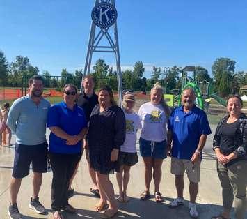 Members of the Kiwanis Club of Petrolia and Area celebrate the opening of Petrolia's new splash pad. Submitted photo.