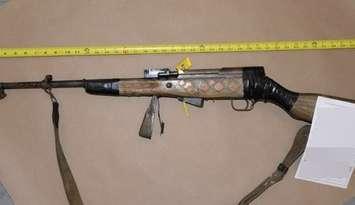 A rifle found inside a burned Devine Street apartment July 26/25 (Photo courtesy of Sarnia Police Service)