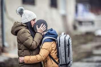 Woman kisses her boy. Photo by MarianVejcik/iStock/Getty Images Plus via Getty Images